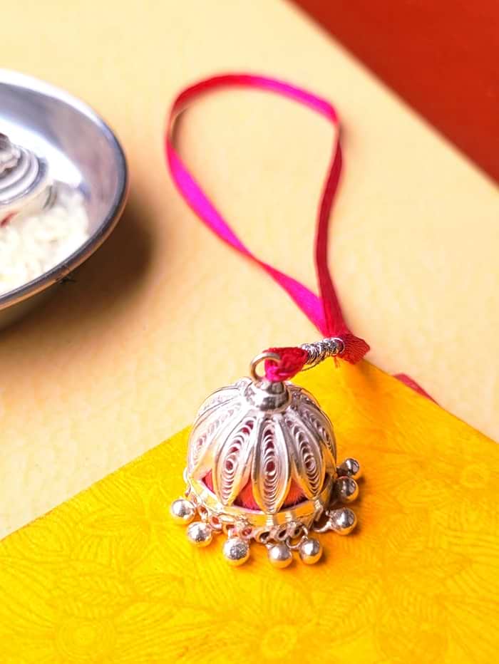 Silver Lumba Rakhi for Bhabhi