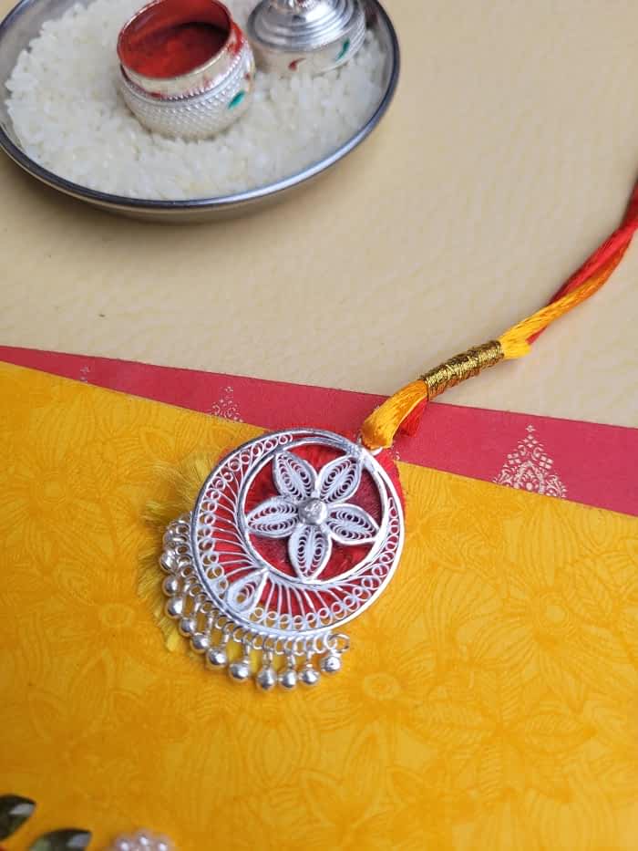 
                      
                        Eternal Bond - Silver Rakhi and Lumba Set
                      
                    