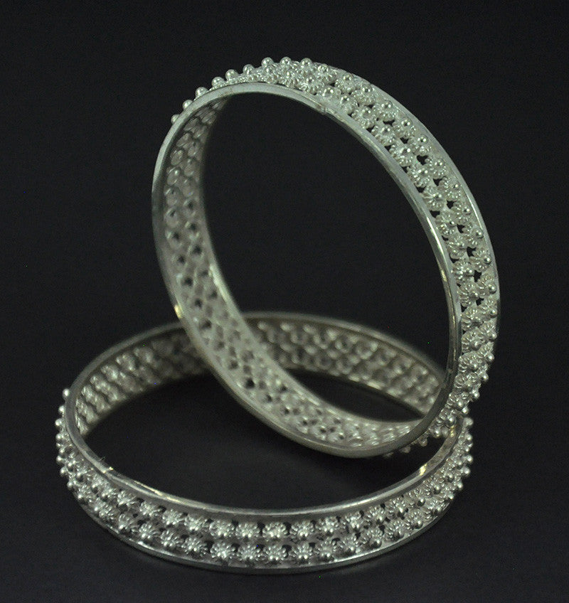 
                      
                        Silver Bangles
                      
                    