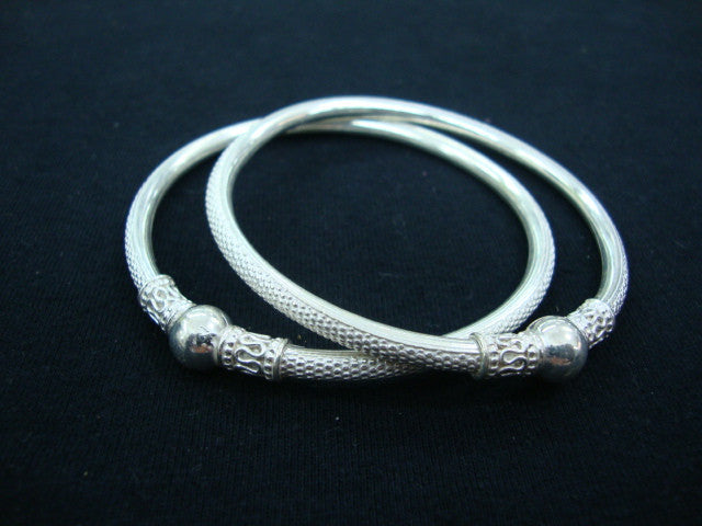 
                      
                        Silver Bangles
                      
                    