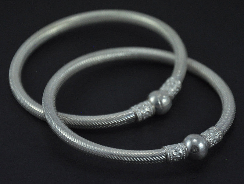 
                      
                        Silver Bangles
                      
                    