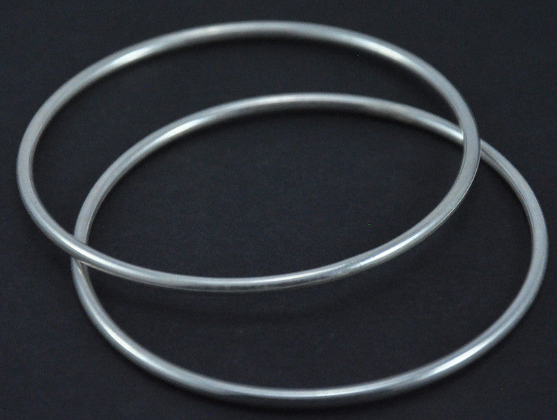 
                      
                        Silver Bangles
                      
                    