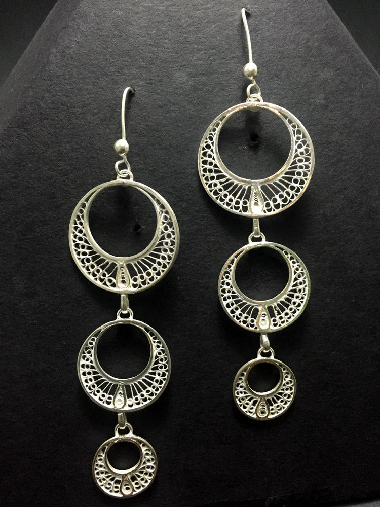 
                      
                        Silver Earrings Swaying and traditional
                      
                    