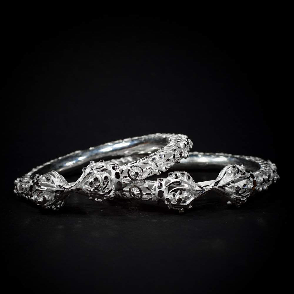 
                      
                        Silver Bangles
                      
                    
