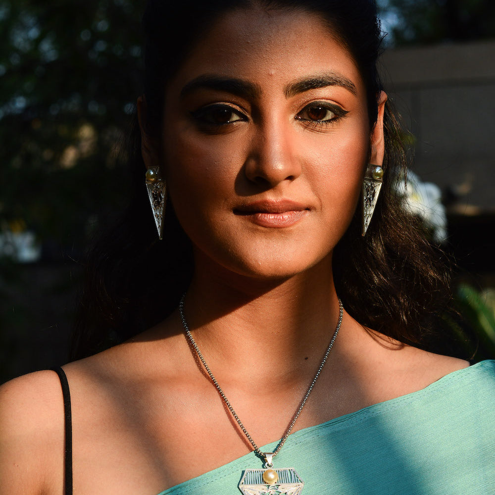 
                      
                        Ganesha Pearl Earrings and Pendant Set
                      
                    