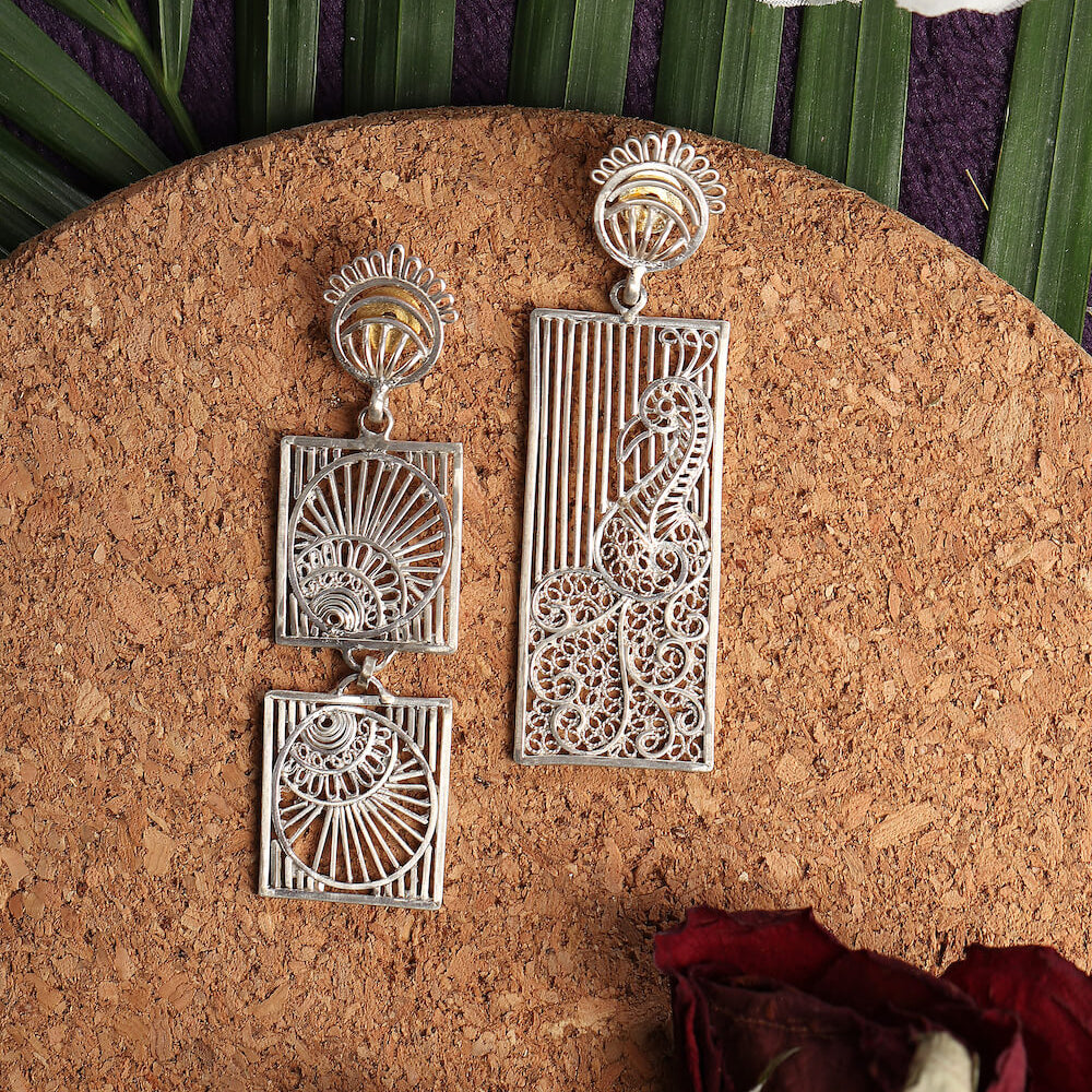 
                      
                        Morni and Pankh Earrings
                      
                    