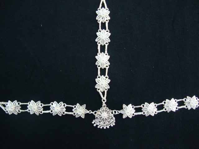 
                      
                        Silver Matha patti Odissi dance
                      
                    