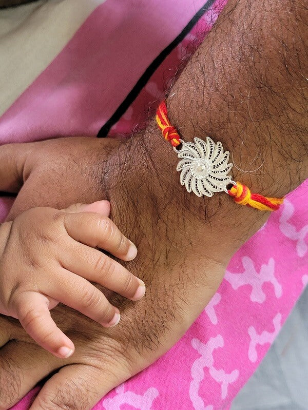 
                      
                        Handmade Silver Rakhi 
                      
                    