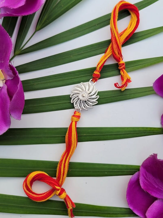 Silver Rakhi with Moli by Silver Linings