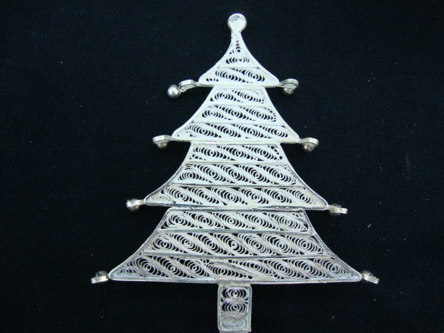 
                      
                        Silver Filigree Christmas Tree
                      
                    