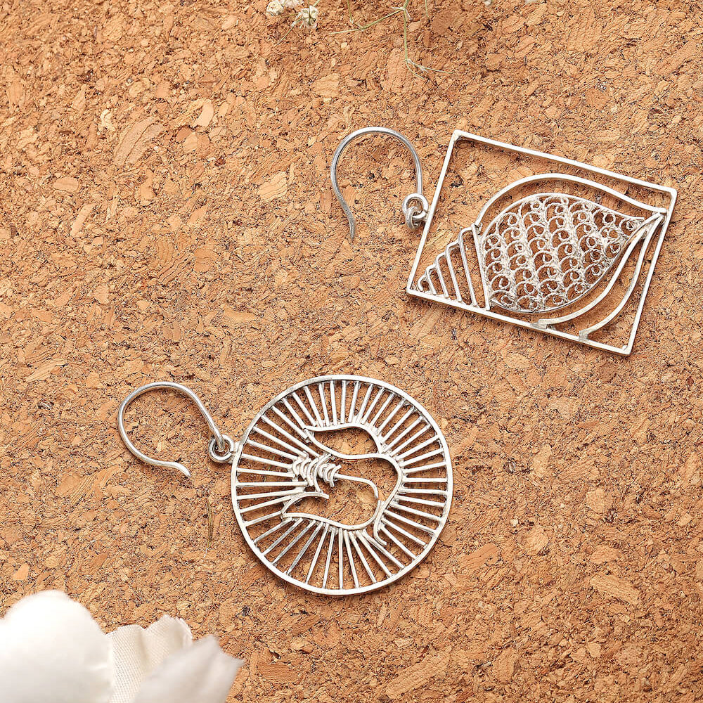 
                      
                        Assymetric Vighnahara Earrings
                      
                    