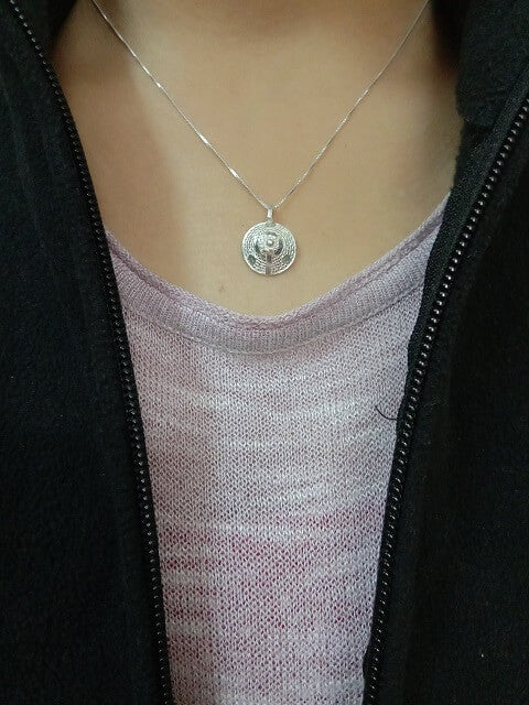 
                      
                        Silver Pendant Madhumati
                      
                    