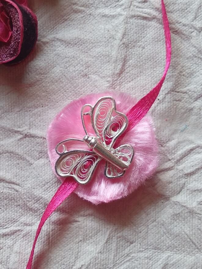 
                      
                        Silver Rakhi for Bhabhi RAK115_3
                      
                    