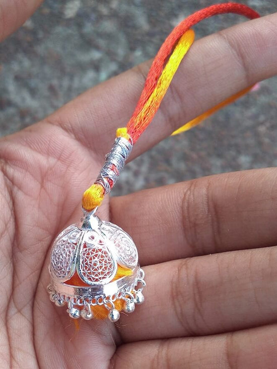 Multiple pearl strings sister or bhabhi bracelet rakhi with gold bead –  Odara Jewellery