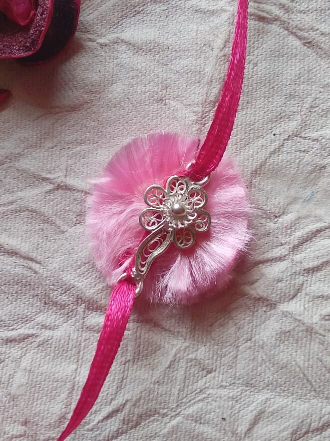 
                      
                        Silver Rakhi for kids RAK114_3
                      
                    