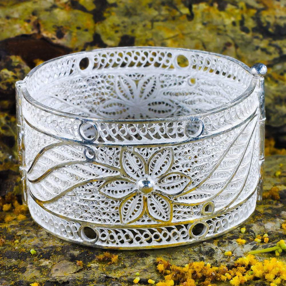
                      
                        Silver Bangles
                      
                    