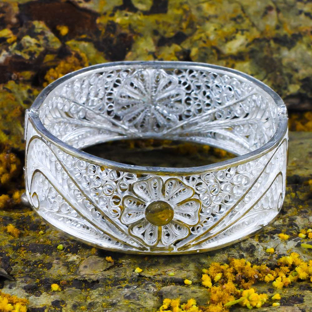 
                      
                        Silver Bangles
                      
                    