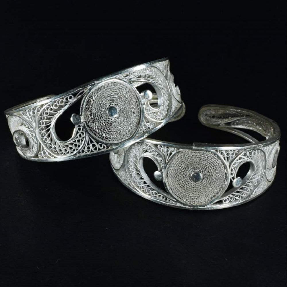 
                      
                        Silver Bangles
                      
                    
