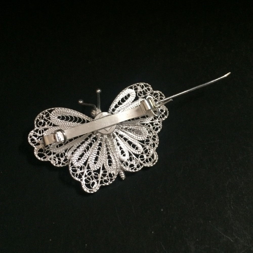 
                      
                        Silver Buttfly saree pin
                      
                    