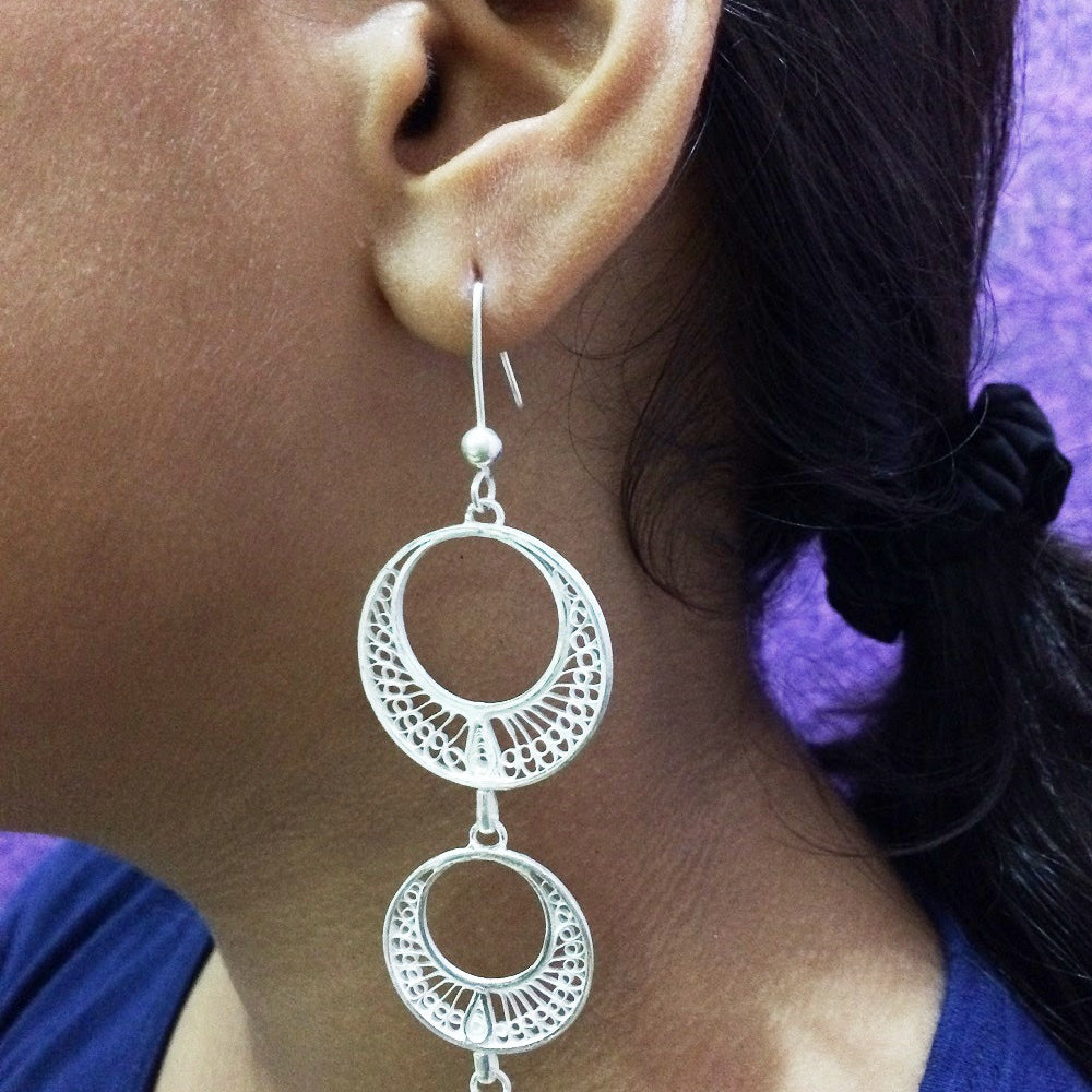 
                      
                        Silver Earrings Swaying and traditional
                      
                    