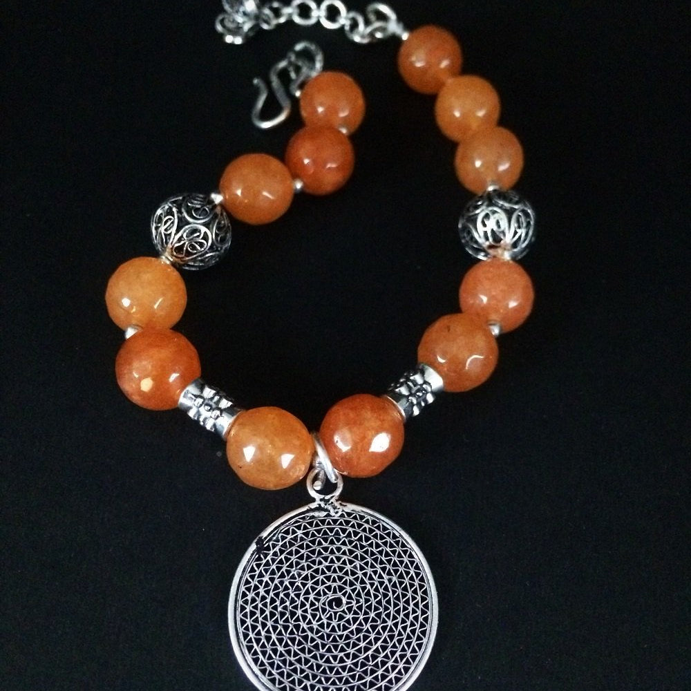 
                      
                        Beads and charms by Silver Linings
                      
                    