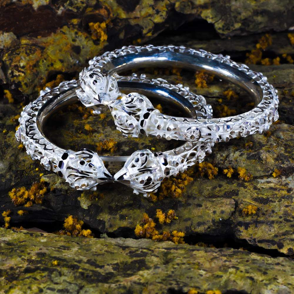 
                      
                        Silver Bangles
                      
                    