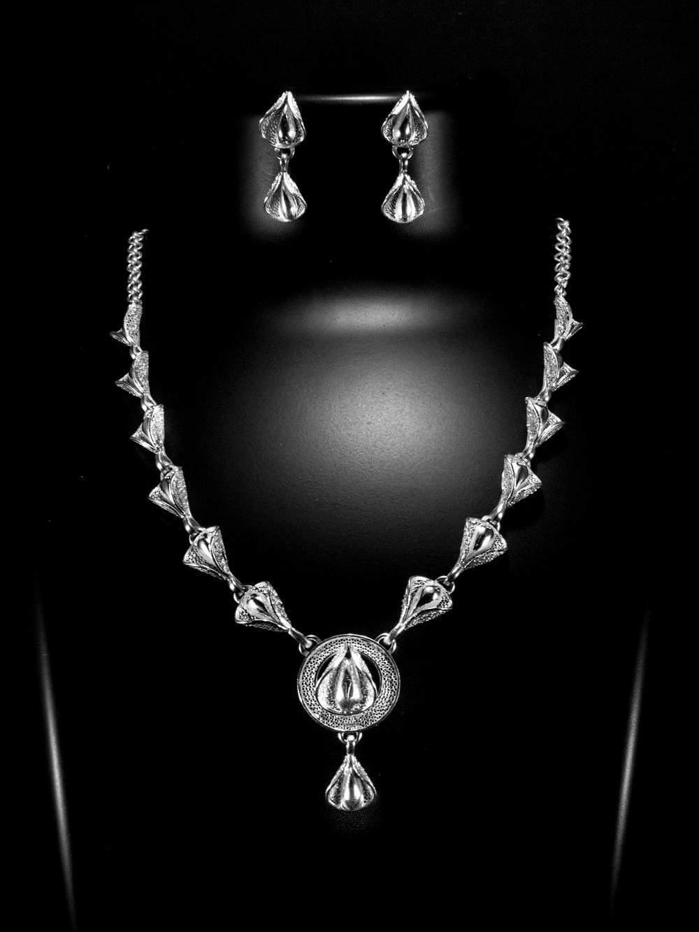 Stylish dangling and curved silver women jewelry set | Silvers Legends