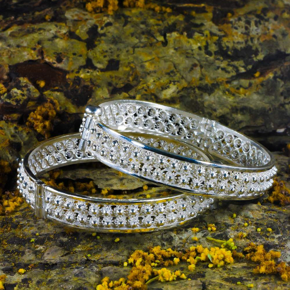 
                      
                        Silver Bangles
                      
                    