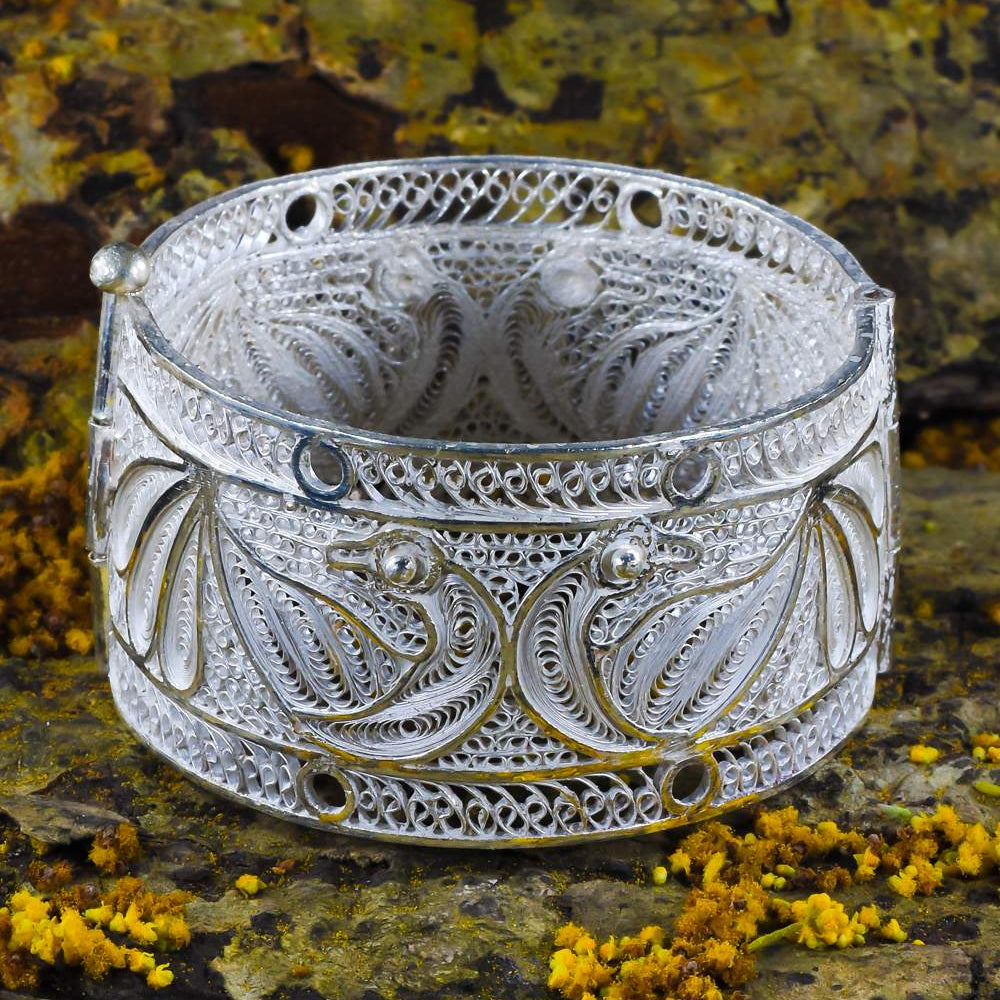 
                      
                        Silver Bangles
                      
                    