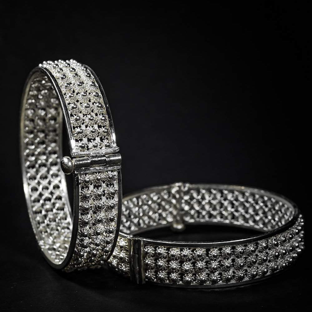 
                      
                        Silver Bangles
                      
                    