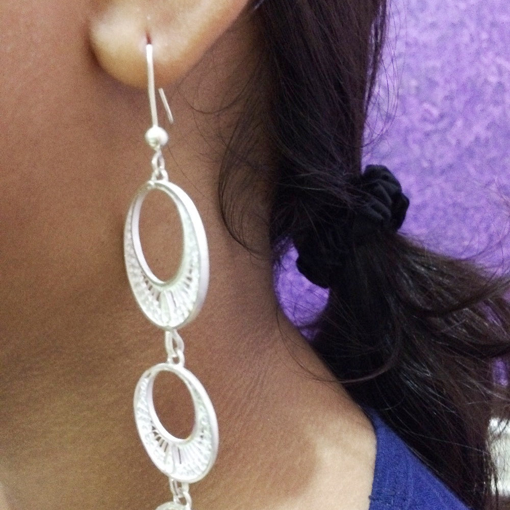 
                      
                        Silver Earrings Swaying and traditional
                      
                    