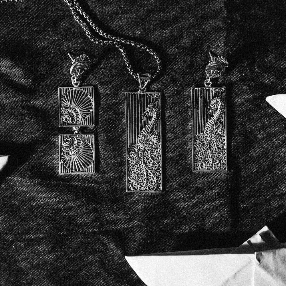 
                      
                        Morni and Pankh Earrings
                      
                    