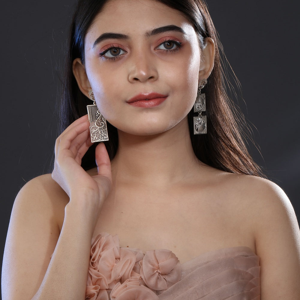 
                      
                        Morni and Pankh Earrings
                      
                    